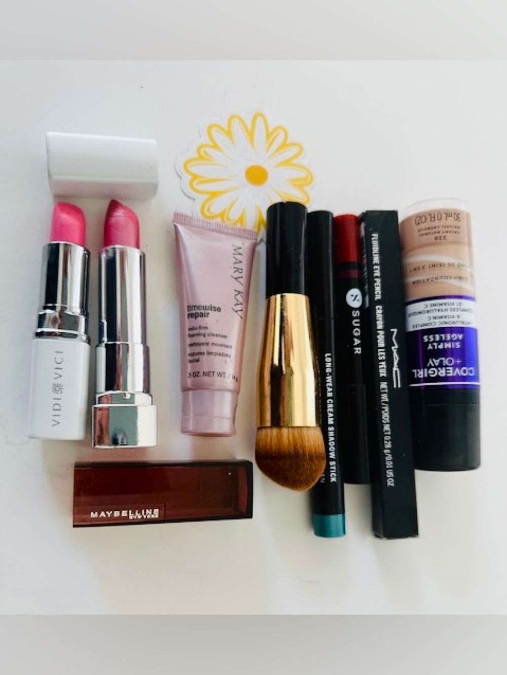 8 Pce Lipstick x 3, Eye x 2, Skin care x 1,  Foundation + Chanel Brush New